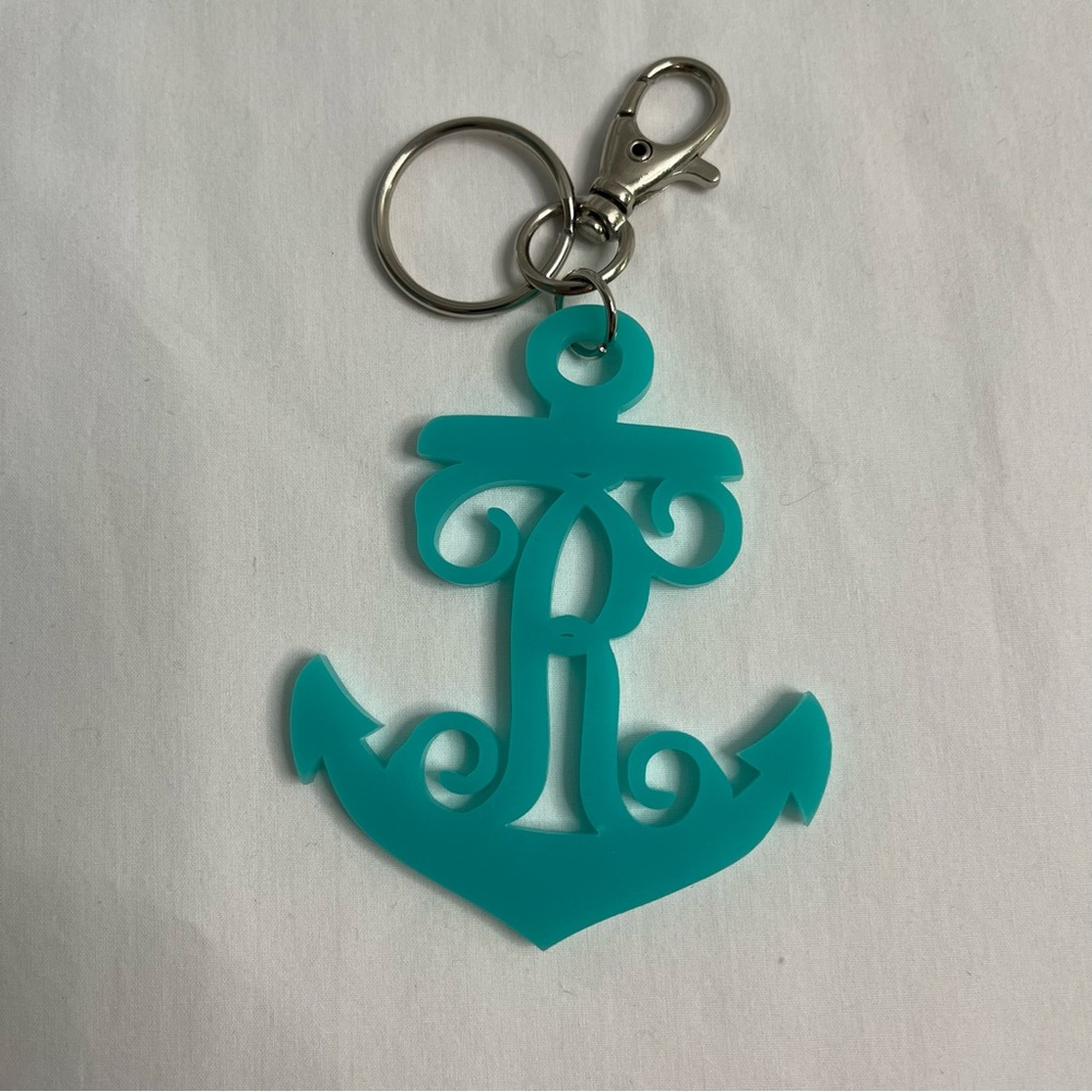Turquoise Anchor Key chain with he Initial “R”